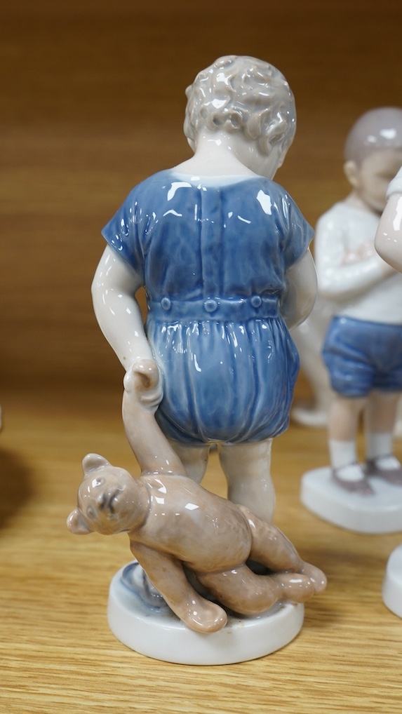 Six Royal Copenhagen or B & G figures of children and a polar bear, tallest 19.5cm. Condition - good.